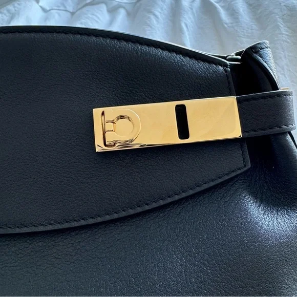Ferragamo Hug Pouch bag in black and gold hardware - Picture 5 of 11